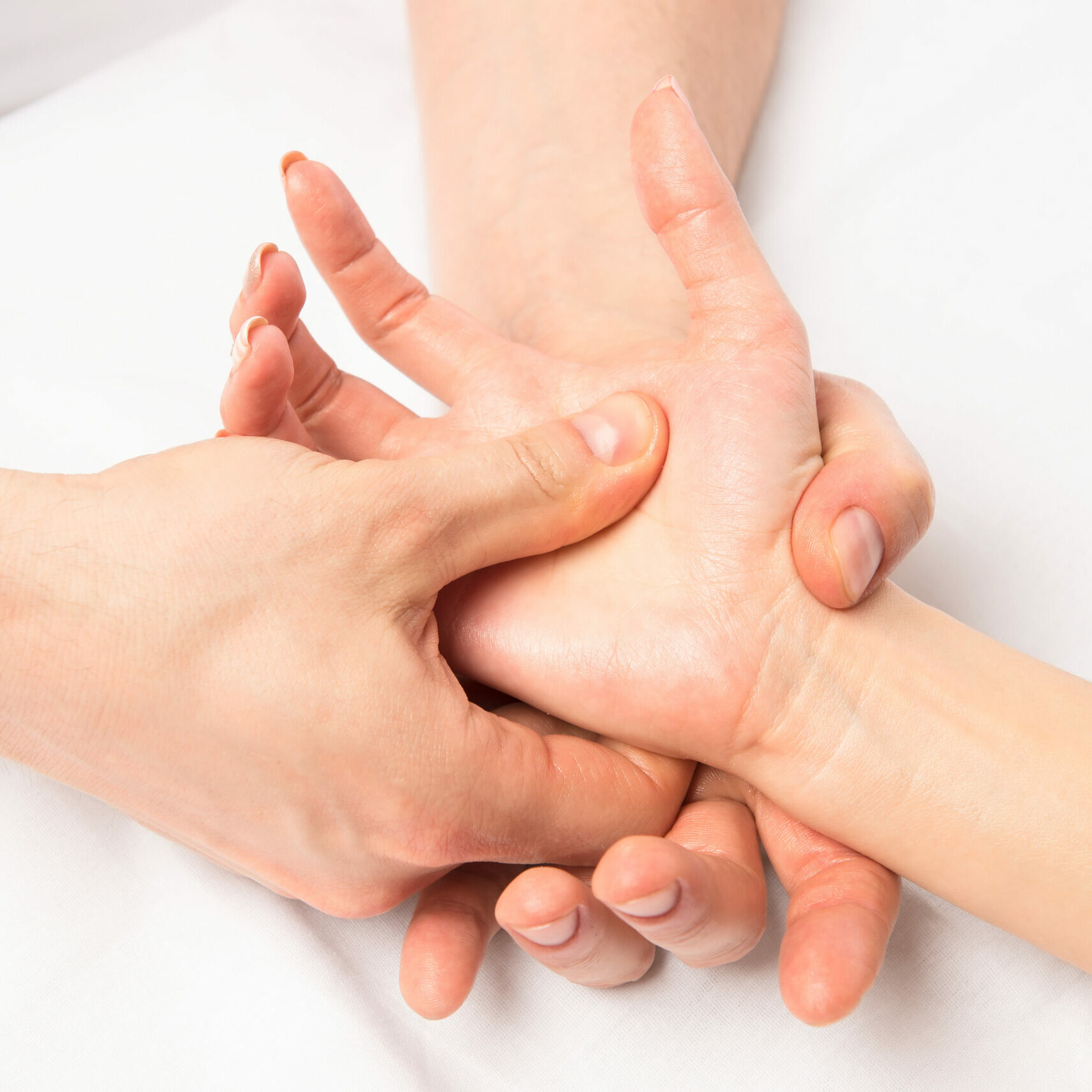 massage hands at certain points, hands close-up